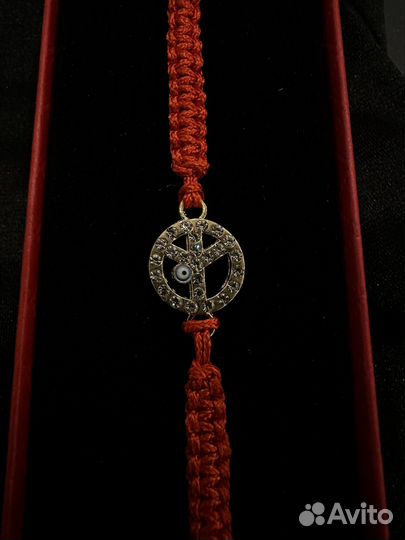 Браслет плетеный с амулетом