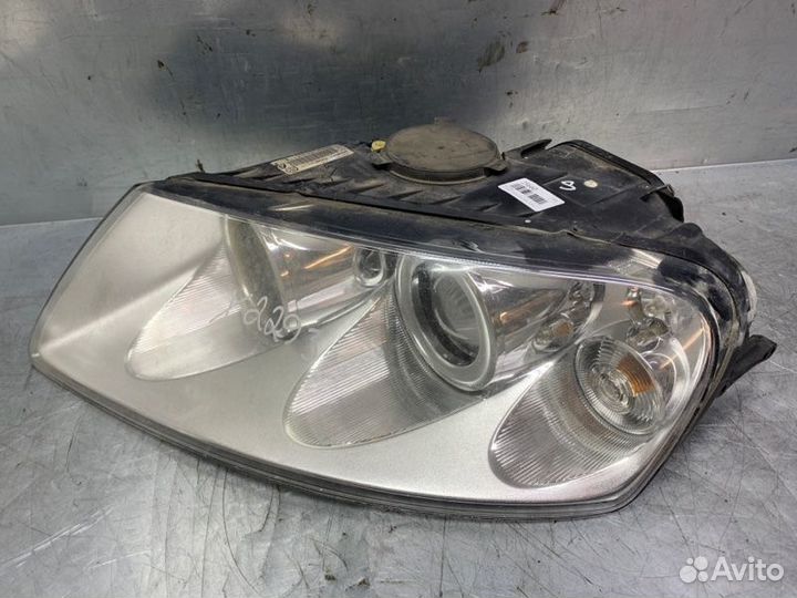 Фара левая Volkswagen Touareg 2002-2010