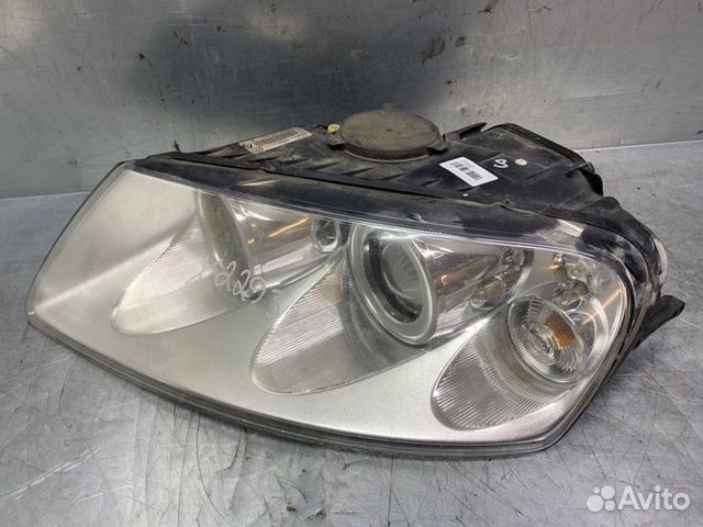 Фара левая Volkswagen Touareg 2002-2010