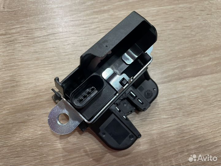 Замок багажника