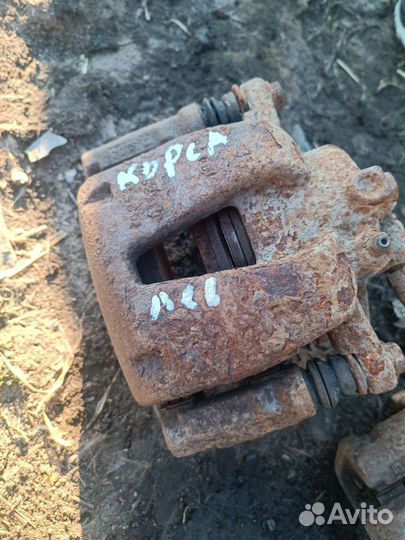 Суппорт левый opel corsa d