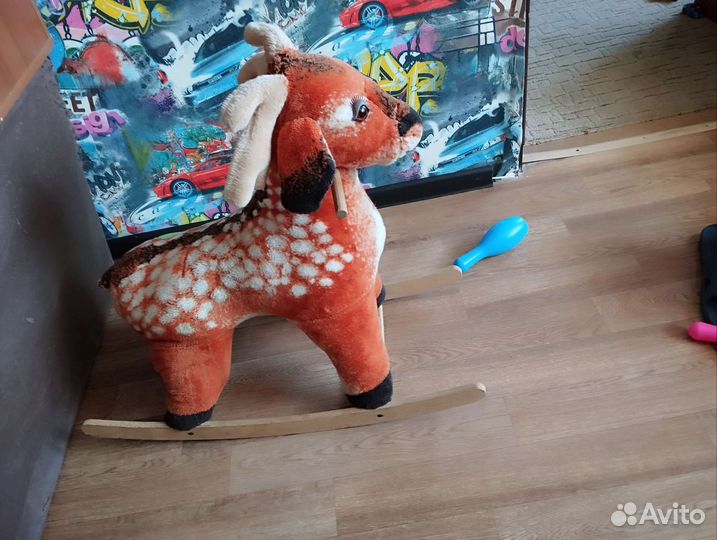 Детская игрушка качалка