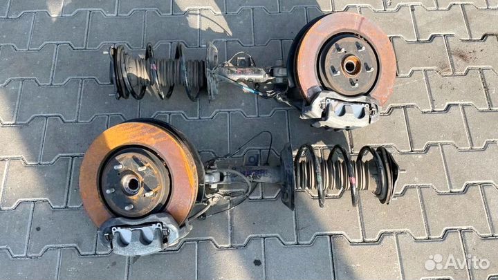 Стойка амортизатора передняя Тойота Рав 4 50 кузов