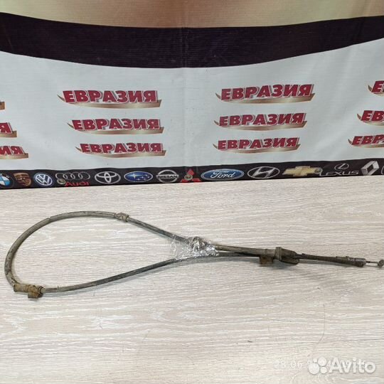 Трос стояночного тормоза левый Honda Domani 1999