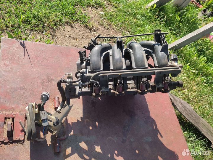 Инжектор в сборе снят с контракеника мазда демио