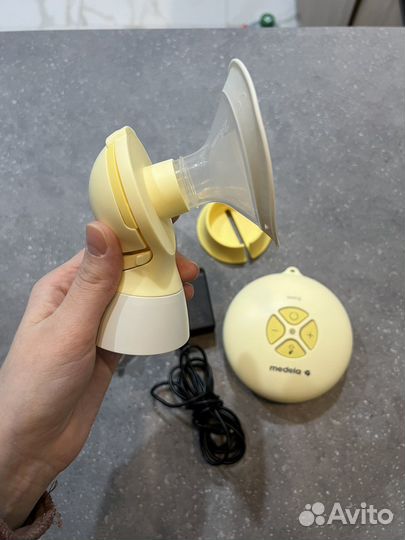 Молокоотсос medela swing