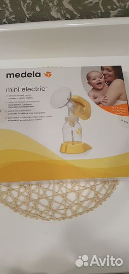 Молокоотсос medela электрический