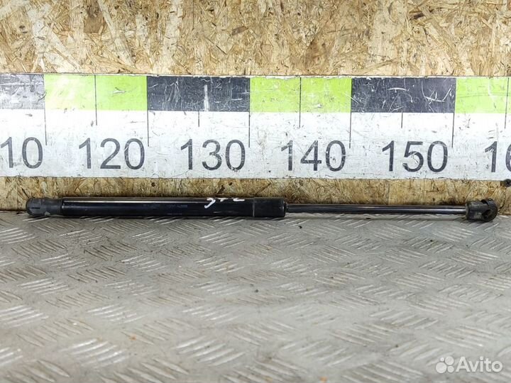 Амортизатор двери багажника Opel Astra H