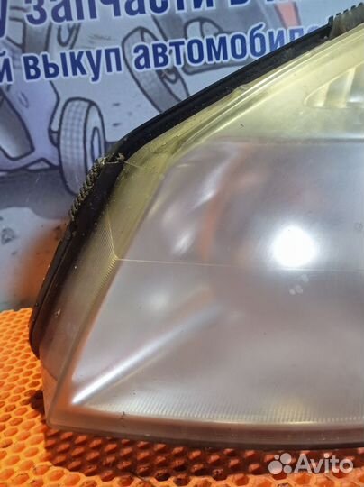 Фара левая Renault Scenic