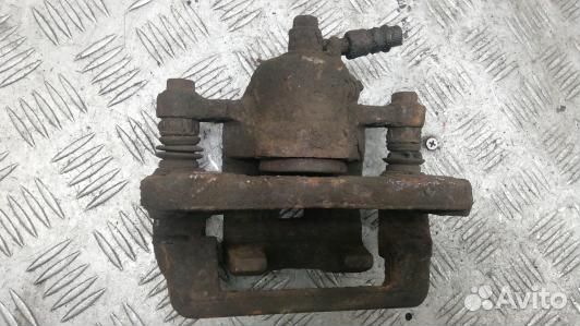 Суппорт тормозной задний правый KIA sportage 2 (PK