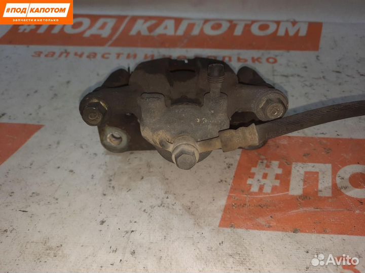 Суппорт тормозной задний левый Nissan X-Trail T31