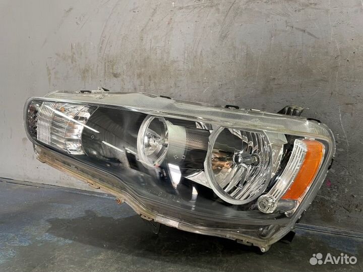 Фара галоген левая Mitsubishi Lancer 10 CY