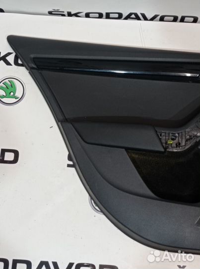 Обшивка двери (карта) задняя левая Skoda Octavia