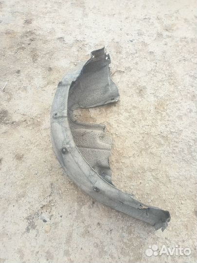 Подкрылок задний левый Toyota Corolla E150