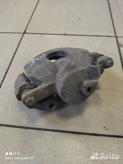 Суппорт тормозной передний правый Volkswagen Polo