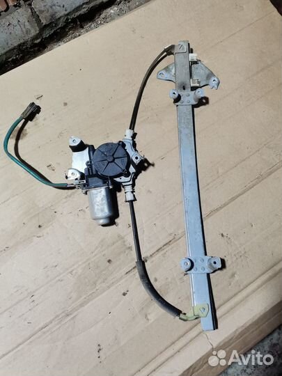 Стеклоподъемник передний левый Nissan Almera Tino