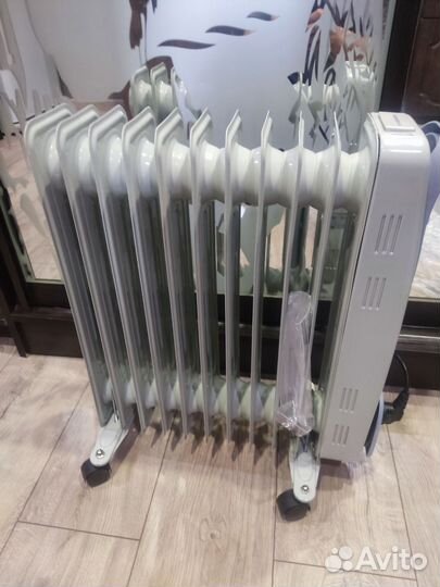 Масляный обогреватель новый