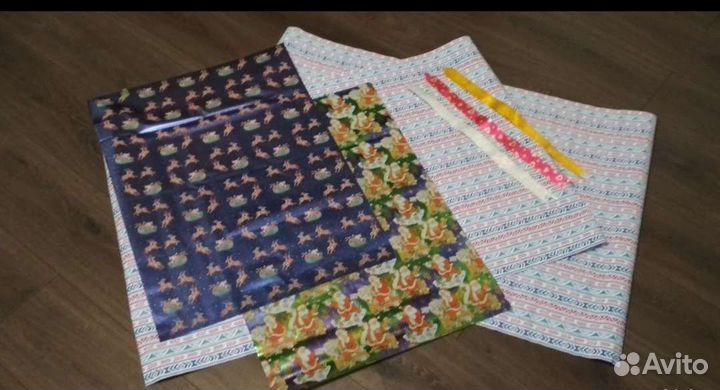 Подарочная упаковка (бумага, плёнка, банты)