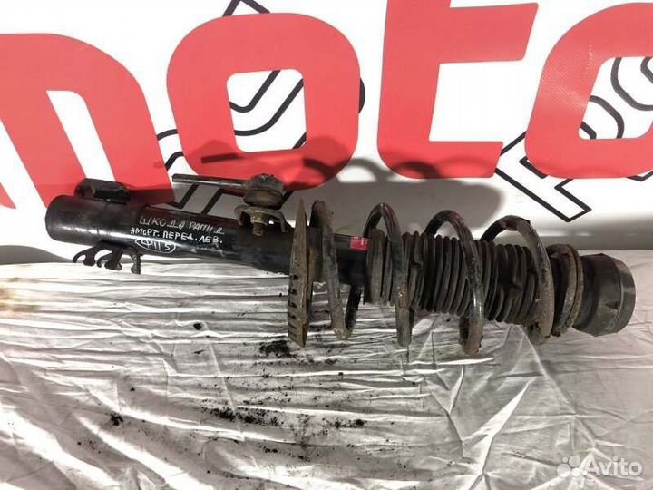 Амортизатор передний левый Skoda Rapid 1 До