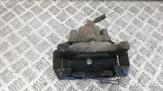 Суппорт тормозной передний правый volkswagen passa