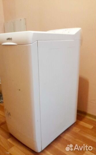 Стиральная машина с вертикальной загрузкой