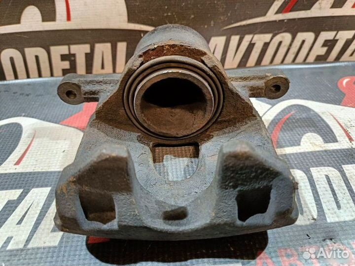 Суппорт тормозной передний Volkswagen Polo