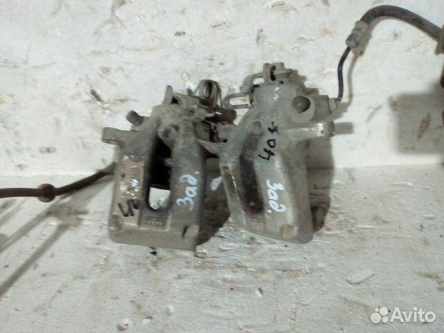 Суппорт тормозной задний Пежо 308 407