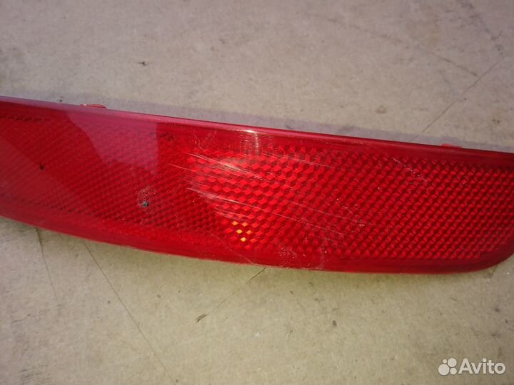 Светоотражатель заднего бампера правый Geely Atlas