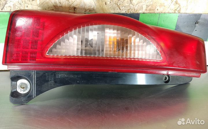 Фонарь задний левый Mazda Carol 2004-2009