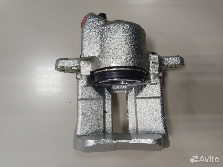 Суппорт тормозной левый renault logan