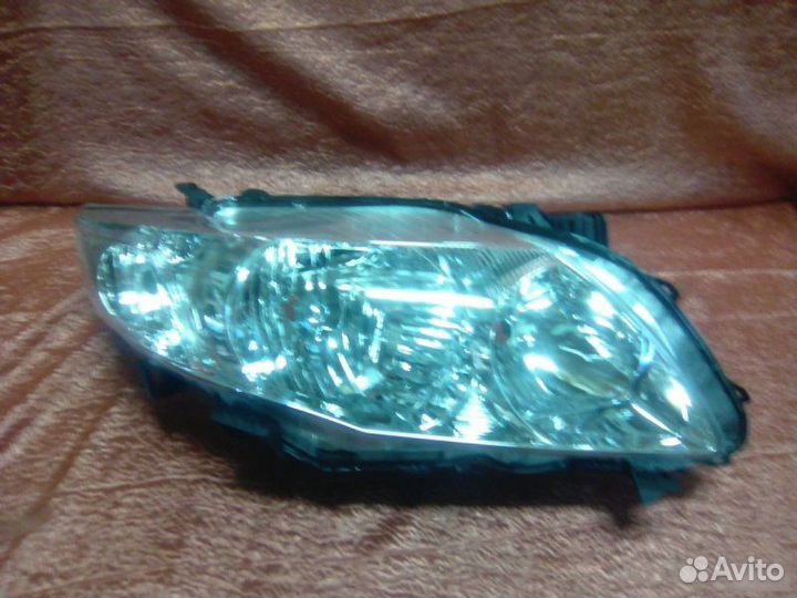 Фара правая Toyota Corolla E150