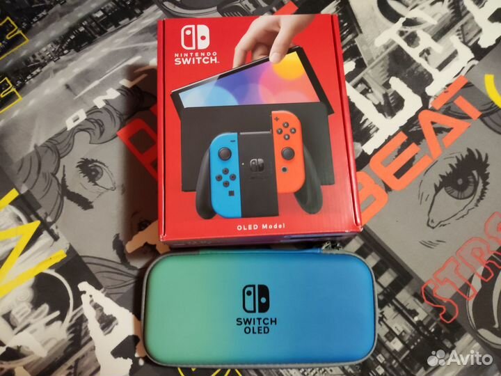 Nintendo Switch Oled 64 GB с двумя играми и чехлом