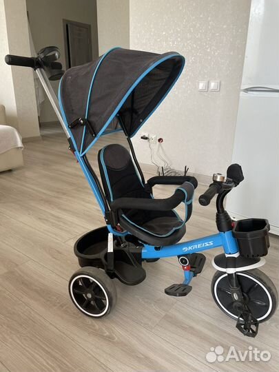 Трехколесный велосипед с ручкой