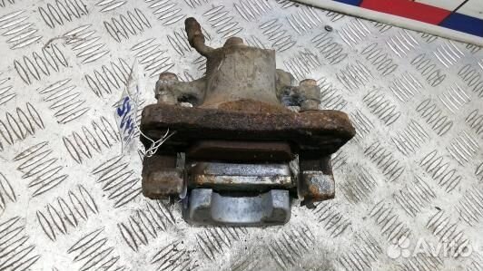 Суппорт тормозной задний левый toyota RAV 4 ZSA3