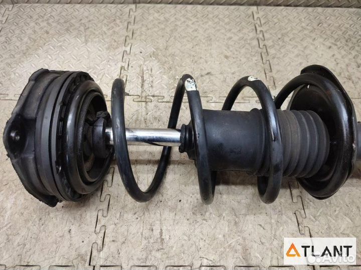 Стойка передняя левая nissan note