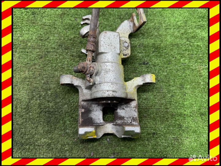 Суппорт тормозной задний левый Mazda 6 1 0