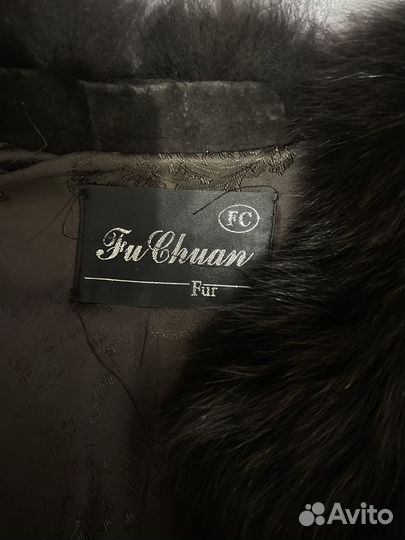 Меховая жилетка женская