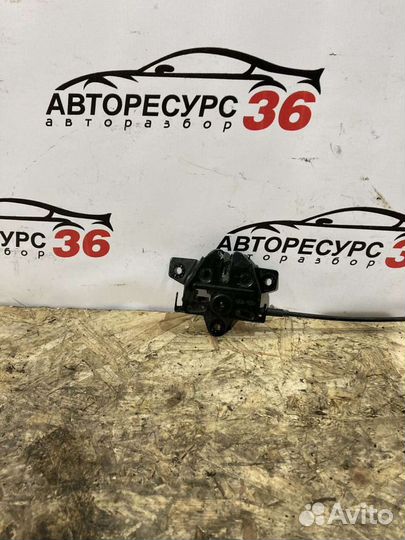 Замок капота Киа Соренто 2 XM FL