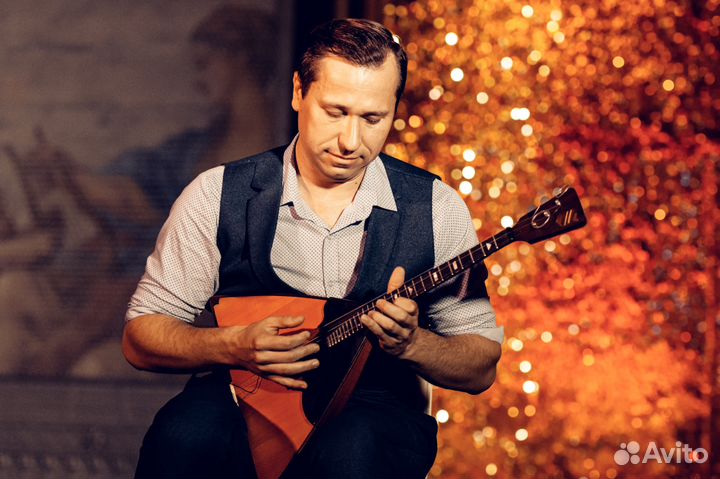 Балалаечник-виртуоз, русский народный ансамбль