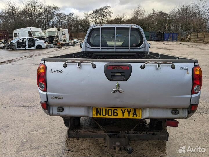 Замок двери передней правой для Mitsubishi L200 4