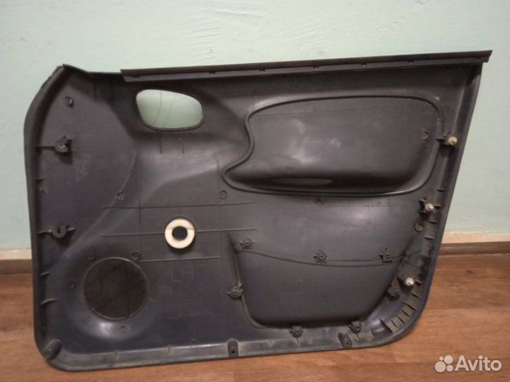 Обшивка двери передняя левая Chevrolet Lanos седан