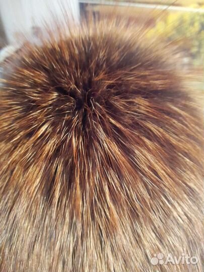 Шапка из енота женская