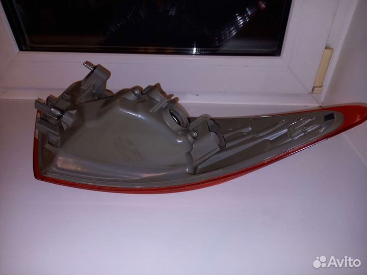 Фонарь правый на крыло Nissan Almera G15