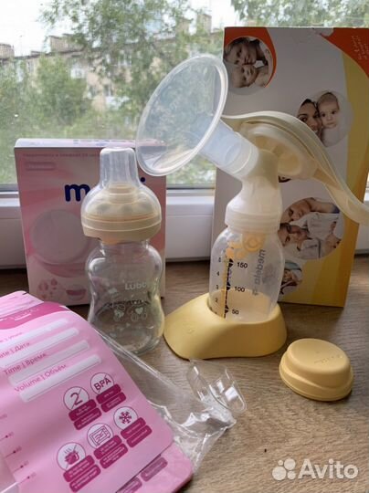 Молокоотсос medela ручной