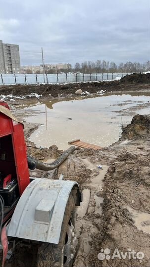Откачка воды мотопомпой