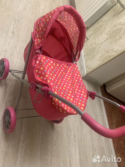 Детская игрушечная коляска