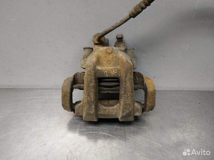 Суппорт задний левый Jeep Grand Cherokee WK2