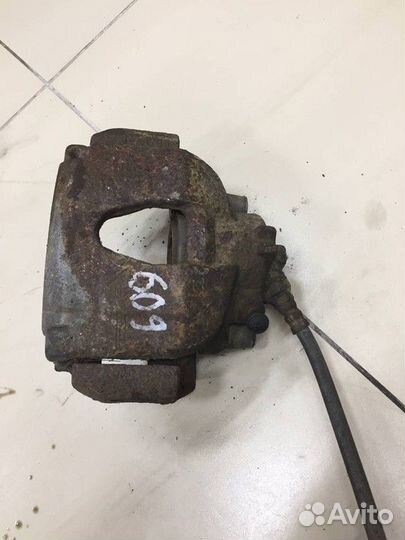 Суппорт тормозной передний левый Renault Megane