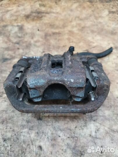 Суппорт тормозной задний правый Chevrolet Lacetti