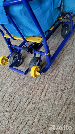 Коляска санки на колесах